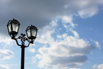street lamp on background of blue sky