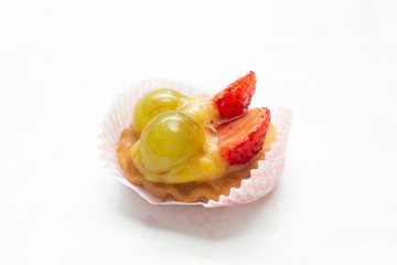 cupcakes with fresh seasonal fruit. Fresh fruit tart with cream and jelly