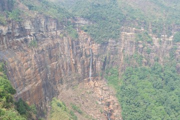 Fototapeta na wymiar natural waterfall in mountains