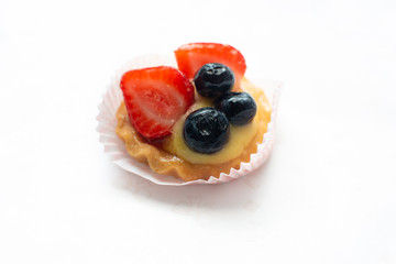 cupcakes with fresh seasonal fruit. Fresh fruit tart with cream and jelly