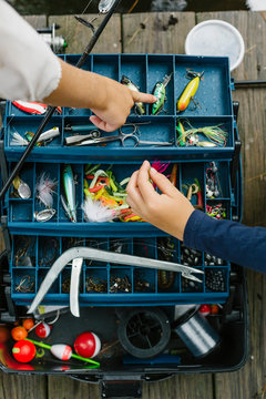 Kids looking in Fishing Tackle Box