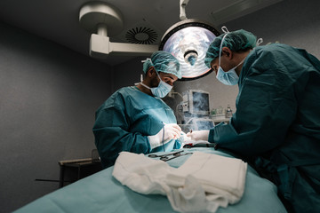 Team of Surgeons Operating in the Hospital
