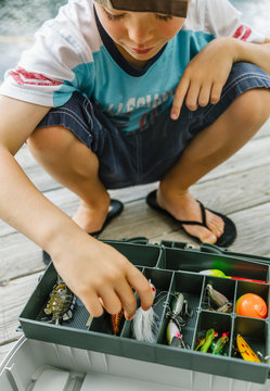 Fisherman Organizing Tackle Box