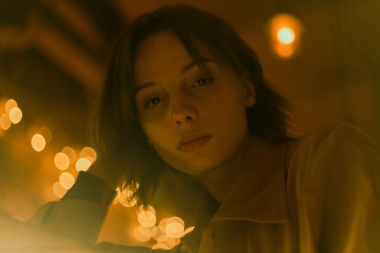 portrait of beautiful waiting girl with soft light