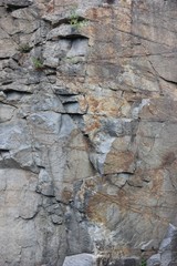 Red granite canyon. Close-up of granite background. Texture
