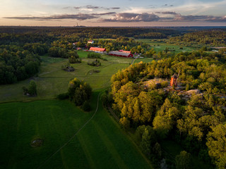 Aerial view of a rural Swedish landscape at sunset