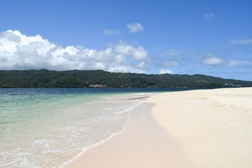 white beach and turquoise ocean