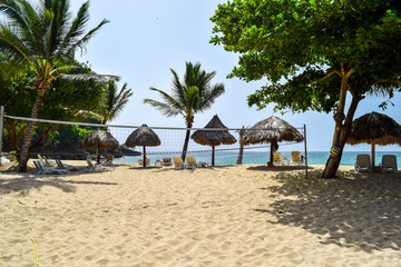 Obraz na płótnie Canvas bar and volleyball field on a beach in the caribbean sea