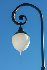 Fototapeta na wymiar Icicle on a street lamp in Saint Petersburg, Russia on a cold winter's day