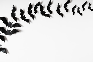 Halloween decorations concept. Halloween with black bats on white background. Flat lay, top view, copy space