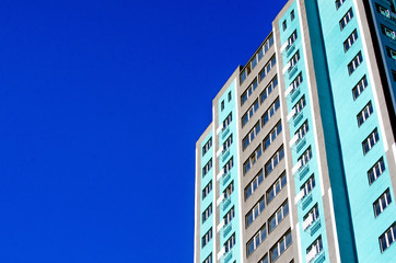 New business center ready for opening, building against blue sky, long-term investment concept