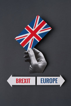 Hand with a union Jack Flag