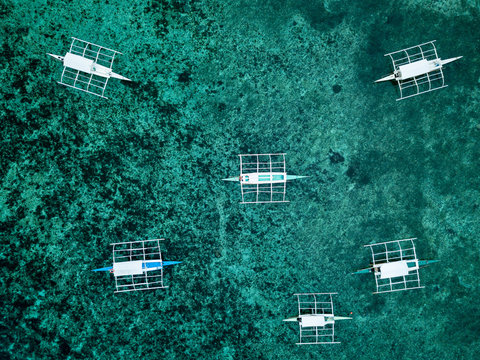 Typical Philippines boats moored on Alona Beach, Bohol