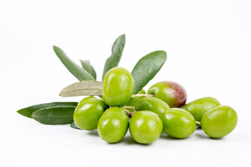 Green fresh olive on the white background