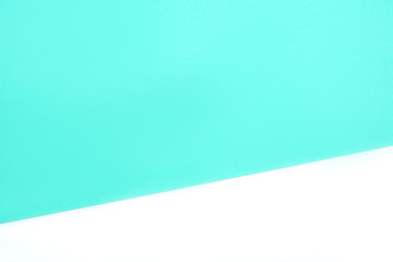 Abstract pastel green and white background.