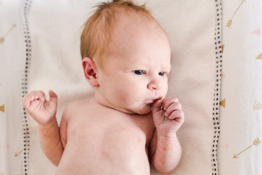 newborn baby with red hair
