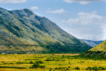 Mountain autumn landscape.Yellow autumn in the mountains of Albania, Montenegro, Albania, Bosnia,  Dinaric Alps Balkan Peninsula. Сan be used for postcards, banners, cards