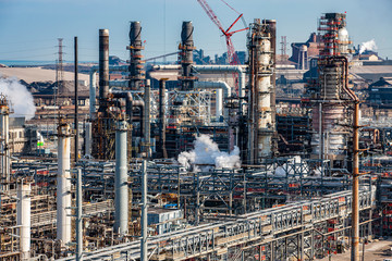 Aerial of refinery with construction in progress