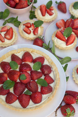 Strawberry tart with cream and mint traditional summer sweet pastry fruit dessert