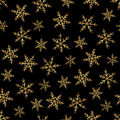 Golden snowflakes on black background seamless pattern hand drawing. Christmas holiday background. Design for fabric, textile, wrapping paper, greeting card.