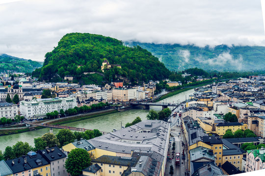 Salzburg panorama on a gloomy and misty day Austrian alps region