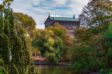 Fototapeta premium sightseeinh in dresden in a park with a lake on a blue sky during summertime