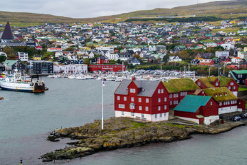 Colorful traditional houses in Tórshavn harbor, Faroe Islands. Urban scene of scandinavian city in...