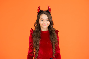 Little devil. Little girl red horns celebrate Halloween. Carnival concept. Small child with imp style accessory Halloween party. Trick or treat. Halloween costumes designed after supernatural figures