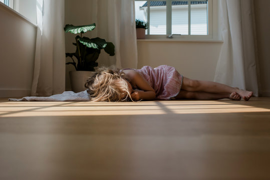 Girl laying down sleeping with blanket