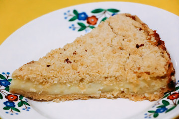A piece of curd cake from short pastry with a delicate filling