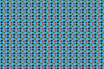 Vivid fruit pattern of fresh berries on colourful background