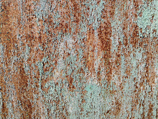 Texture of metal rusty wall brown blue background. Paint rusty textured metal background. Cracked paint, rust surface.