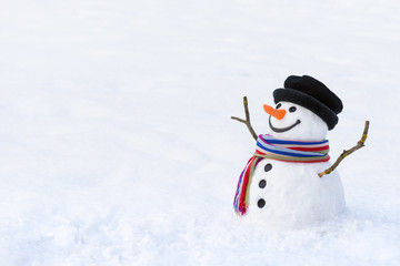Cute snowman in deep snow - obrazy, fototapety, plakaty