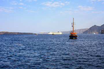 Ships sailing along the shores of Santorini