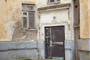 Textured walls and ruins of an old house