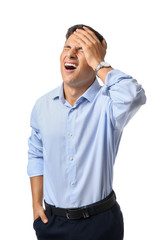 Portrait of hopeless young businessman on white background