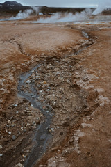 Red clay hill in the geothermal area Hverir, Iceland in summer. Myvatn region, North part of Iceland