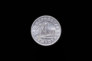 Old Hungarian 50 Filler coin from 1984, obverse showing Elisabeth Bridge in Budapest. Isolated on...