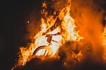 Riding bicycle through fire