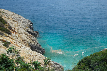 coast of the Mediterranean Sea. The shore is composed of limestone and marble.