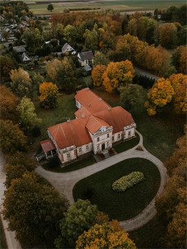 Old and dusty manor at Lithuania from drone perspective, near Joniskis.