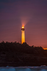 Fototapeta premium Biarritz lighthouse in a beautiful sunset. France, vertical photo