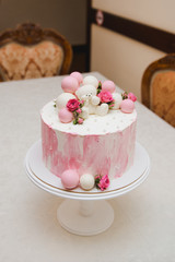 Pink First Year Birthday Cake with bear. Birthday cake with a bear and balls for the girl