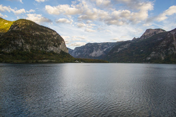 The beautiful lake at the famous village of Hallstatt in Austria.  This lake is surrendered by mountains and the village located on its shore.  