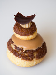 Coffee profiterole, religious dessert, french cake with chocolate