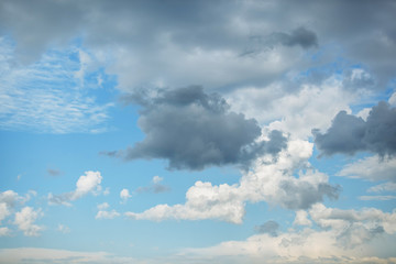  blue sky with white and gray clouds