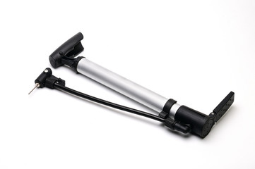 Fototapeta premium Pump and needle for pumping air on a white background