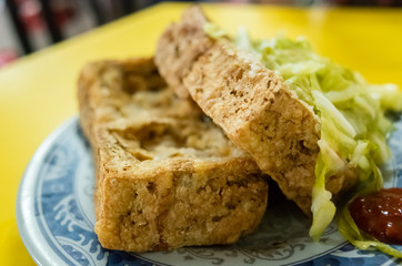 Fototapeta na wymiar famous Taiwanese snack of stinky tofu