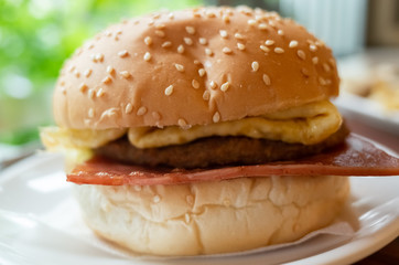 eat delicious hamburger at a restaurant