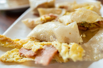 Fototapeta na wymiar traditional breakfast of chinese omelet